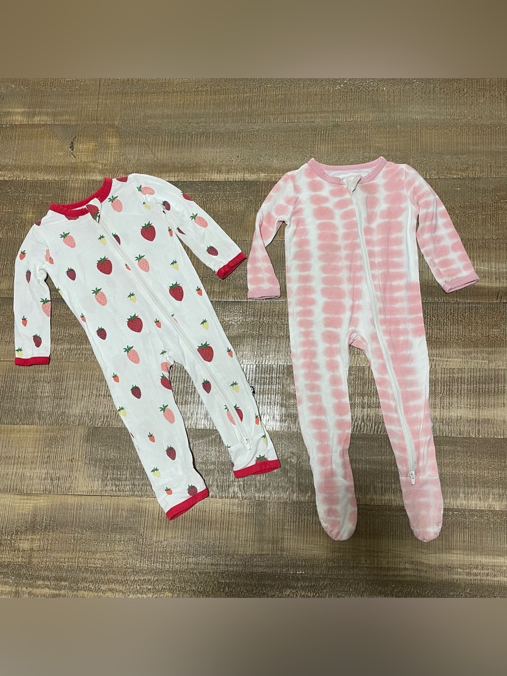 Bundle of two Kyte BABY Pink Tie-Dye and White Strawberry Footie Set
